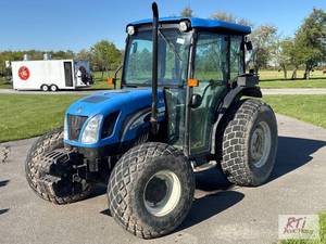 lot 78 image: New Holland TN70DA tractor. 3,897 hours. Encl...