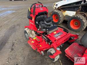 lot 92 image: Gravely ProStance stand on mower. 1663 hours....