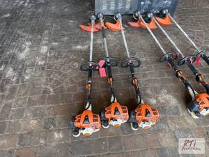 lot 100 image: (3) STIHL string trimmers. Item is located in...