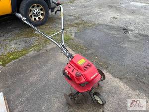 lot 103 image: Honda F210 rototiller. Operational condition....