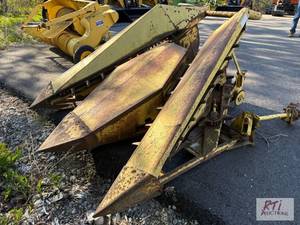 lot 108 image: New Holland 717R2 2-row corn head. Working co...
