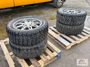 lot 152 image: Full set of (4) wheels and tires removed from...