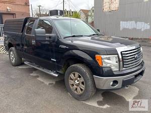 lot 7 image: 2012 Ford F-150 XLT pickup truck. VIN 1FTFX1E...