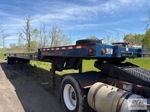 lot 24 image: 2003 Landoll 330B sliding axle container trai...