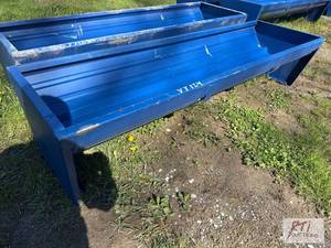 lot 28 image: 90in steel feeding trough. MDI Item is locat...