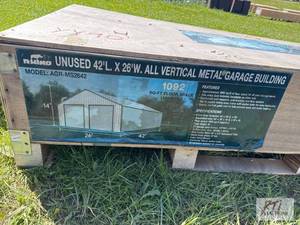 lot 32 image: Rhino 42 x 26 metal garage building with 14ft...