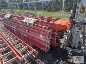 lot 77 image: Approximately 19, 24 foot extension ladders....