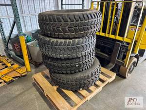 lot 66 image: (4) 37X12.50X16.5LT tires...