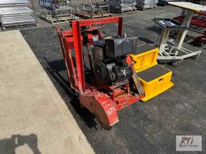 lot 115 image: Target concrete saw. Runs and operates....