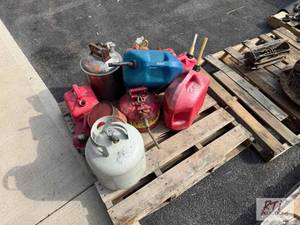 lot 147 image: Gas cans and propane tank...