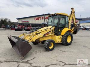 lot 25 image: New Holland LB75B backhoe, 4WD, sta...