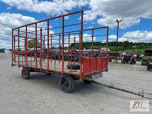 lot 131 image: Metal basket wagon on John Deere ru...