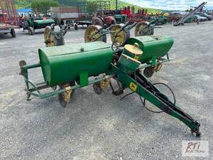 lot 135 image: John Deere 4-row planter...