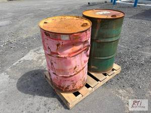 lot 253 image: (2) 55 gal empty drums...