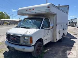 lot 8 image: 2001 GMC Savana 3500 utility van. VIN 1GDJG31...