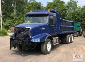 lot 41 image: 2002 Volvo VHD dump truck. 18 ft dump box. GV...