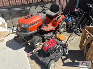 lot 85 image: Lot of 2 lawn mowers. Includes a Husqvarna LT...