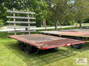 lot 147 image: Home built tandem axle wagon. Metal deck, dim...