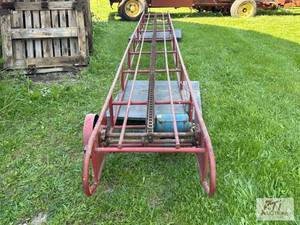 lot 156 image: 20 ft hay elevator, powered by a Wisconsin en...