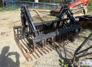 lot 181 image: HLA 7 ft rock grapple bucket. Skid steer quic...