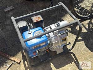 lot 232 image: Gas powered water pump, runs and pumps water....