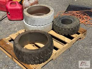 lot 249 image: Pallet of forklift tires. This item is locate...