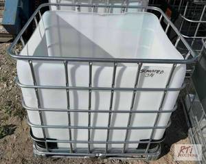 lot 294 image: 10x caged liquid totes with open tops. Locate...