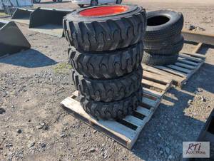 lot 159 image: 4X Forerunner 10-16.5 skid loader tires and r...