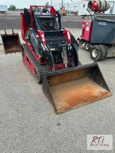 lot 4 image: Toro Dingo TX-1000 stand on track s...