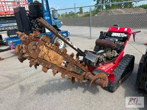 lot 27 image: Barreto walk-behind track chain tre...