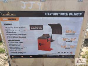 lot 114 image: LandHonor heavy duty wheel balancer...