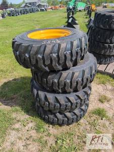 lot 171 image: 4X Forerunner 10x16.5 skid loader t...
