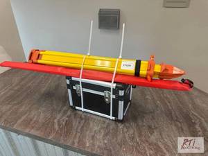 lot 210 image: Laser transit with tripod and gradi...