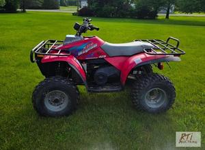 lot 77 image: 1996 Polaris Magnum 425 ATV. 692 mi...