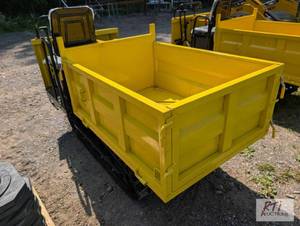 lot 52 image: SDLanch tracked end dump with fold ...