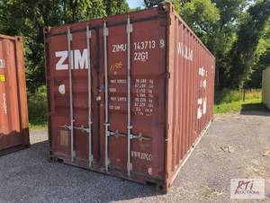 lot 59 image: 20ft shipping container, 8.5ft tall...