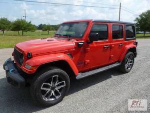 lot 16 image: 2024 Jeep Wrangler Sport 4XE. VIN1...