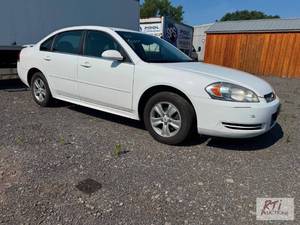 lot 31 image: 2014 Chevy Impala. VIN2G1WA5E34E11...