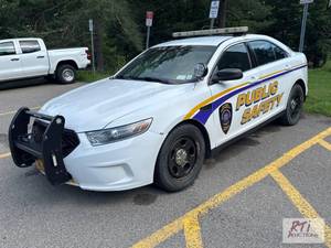 lot 32 image: 2013 Ford Taurus Police AWD sedan. ...