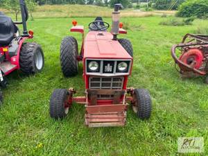 lot 118 image: International 284 Farmall Cub Tract...