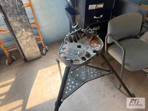 lot 220 image: RIDGID 450 TRI STAND. The items are...