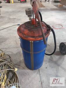 lot 56 image: Small oil tank with hand pump...