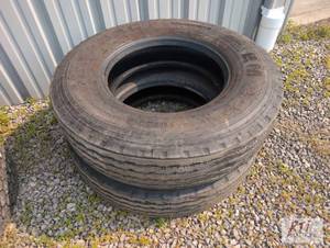 lot 63 image: (2) Emtrac 11R22.5 truck tires...