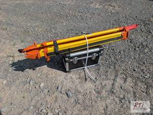lot 110 image: Laser transit with tripod and gradi...