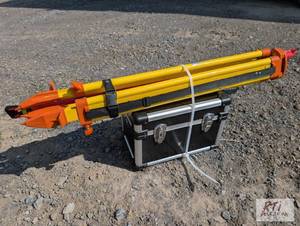 lot 111 image: Laser transit with tripod and gradi...