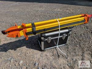 lot 112 image: Laser transit with tripod and gradi...
