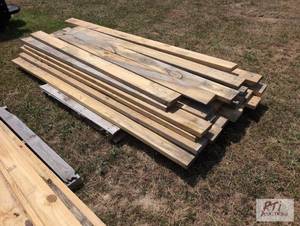 lot 148 image: Pile of mixed 2in lumber. Item is l...