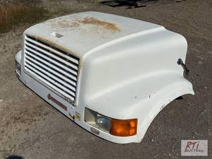 lot 203 image: International truck hood. Fits I...