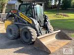 New Holland L328 skid steer load...