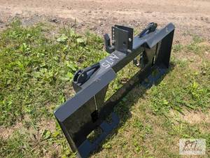 lot 194 image: Wolverine skid loader quick hitch a...